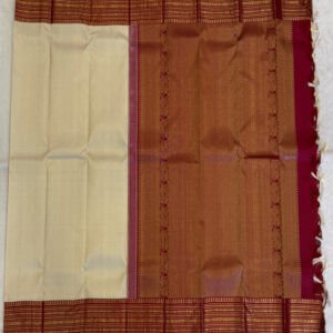 A Traditional Ivory and Maroon Kanjeevaram Saree
