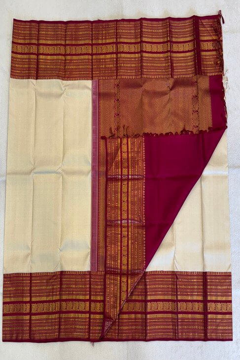 A Traditional Ivory and Maroon Kanjeevaram Saree
