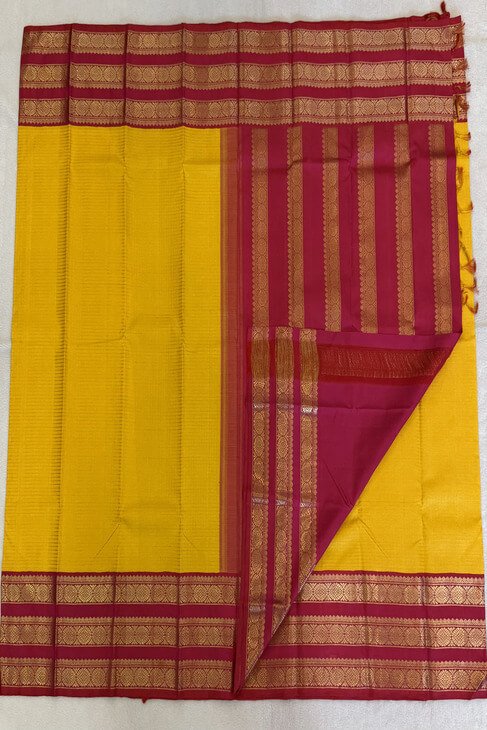 A Traditional Yellow and Pink Kanjeevarm Saree