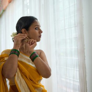 A Yellow Satin Silk Saree